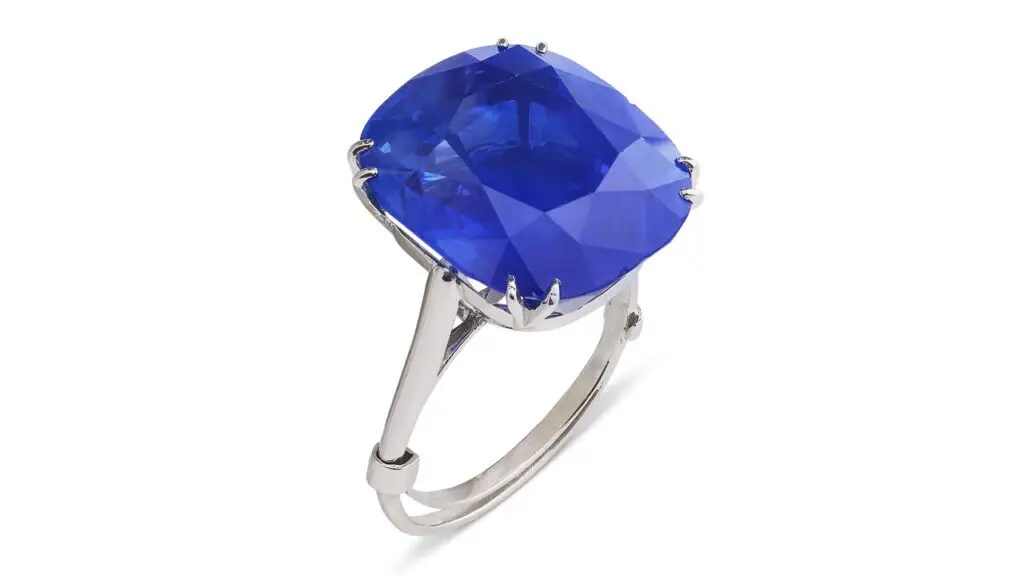 A Chaumet ring with a cushion-shaped, 22.28-carat, royal-blue Kashmir sapphire at Christie's image
