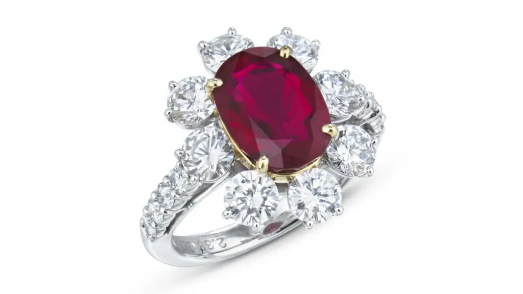 This ring centers an oval brilliant-cut, 3.34-carat Burmese ruby in a frame of eight round diamonds at Christie's image