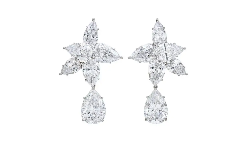 A pair of Fred earrings with pear brilliant-cut diamonds of 10.69 and 10.23 carats diamonds, suspended from pear diamonds weighing between 2.39 and 5.05 carats at Christie's image