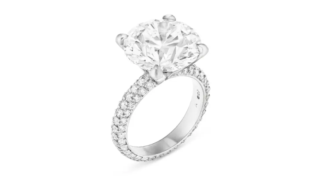 A round brilliant-cut, 10.03-carat, D, VS1, type IIa diamond is the star of this ring. It also features approximately 98 round diamonds on the band at Christie's