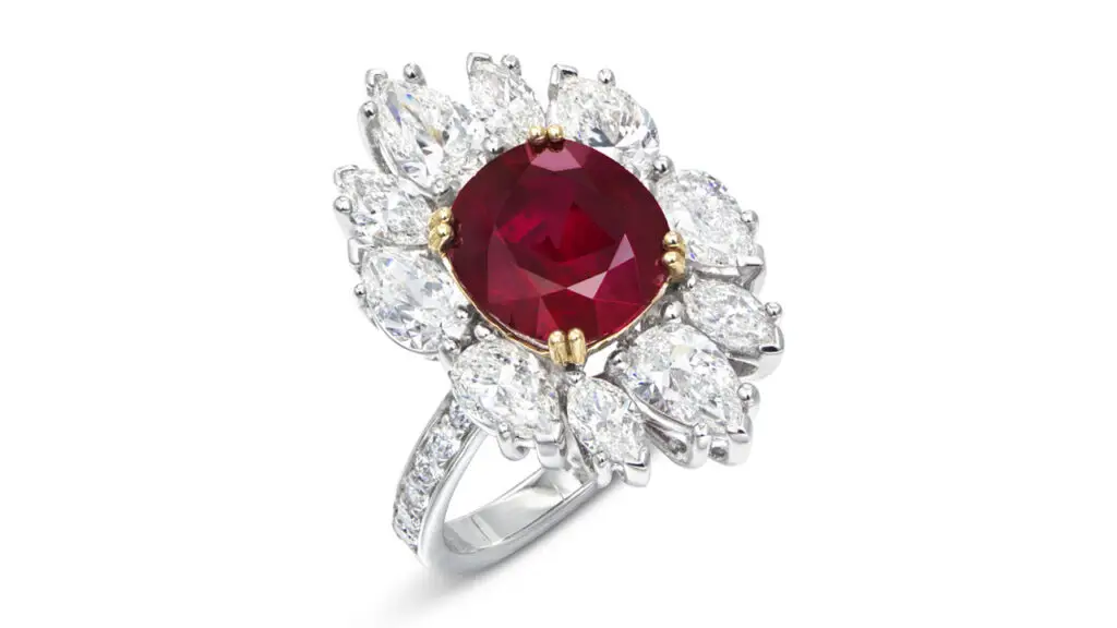 This ring bears an antique cushion-cut, 4.28-carat Burmese ruby in a surround of various-cut diamonds, with additional diamonds on the band at Christie's image