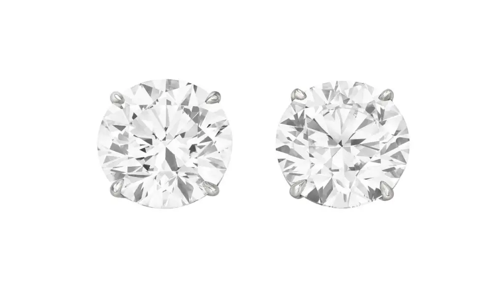 A pair of stud earrings, these showcase round brilliant-cut, 5.01-carat diamonds, with one a D, VS2 and the other an E, VS1 at Christie's