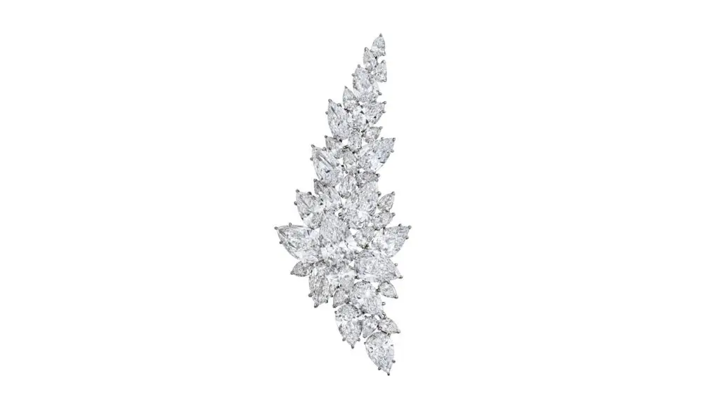 A diamond brooch featuring pear brilliant-cut, D-color diamonds weighing between 2.38 to 8.69 carats at Christie's image