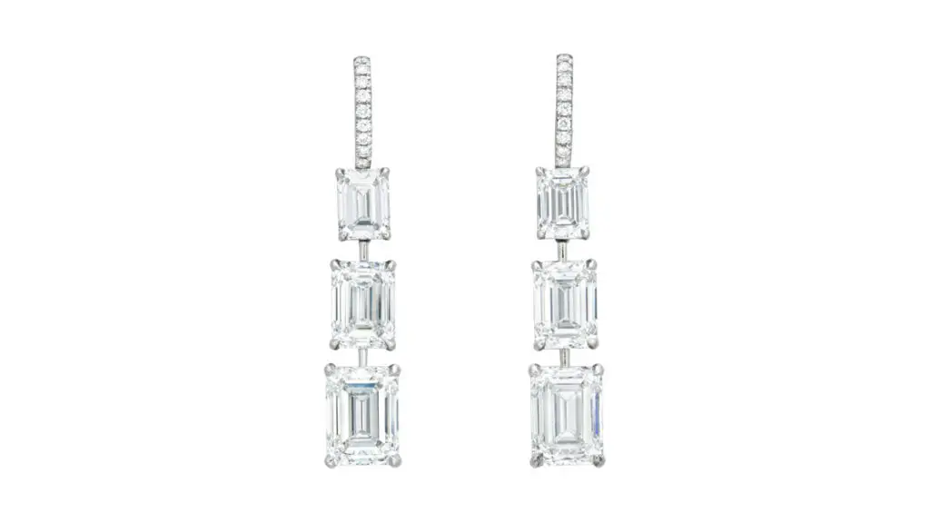 A pair of earrings containing six emerald-cut, D-color, internally flawless diamonds weighing between 1.01 and 3.01 carats — a total of 12.05 carats at Christie's image
