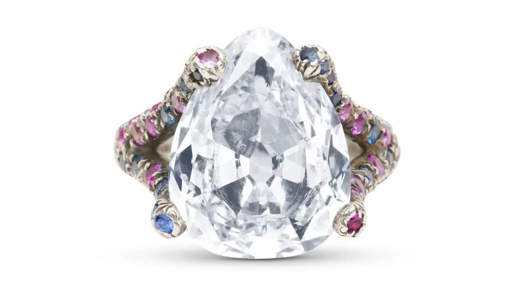 This ring bears a pear-shaped modified brilliant-cut, 8.01-carat, I-color, SI1-clarity, type Ia diamond, with rubies and sapphires along the band Christie's image