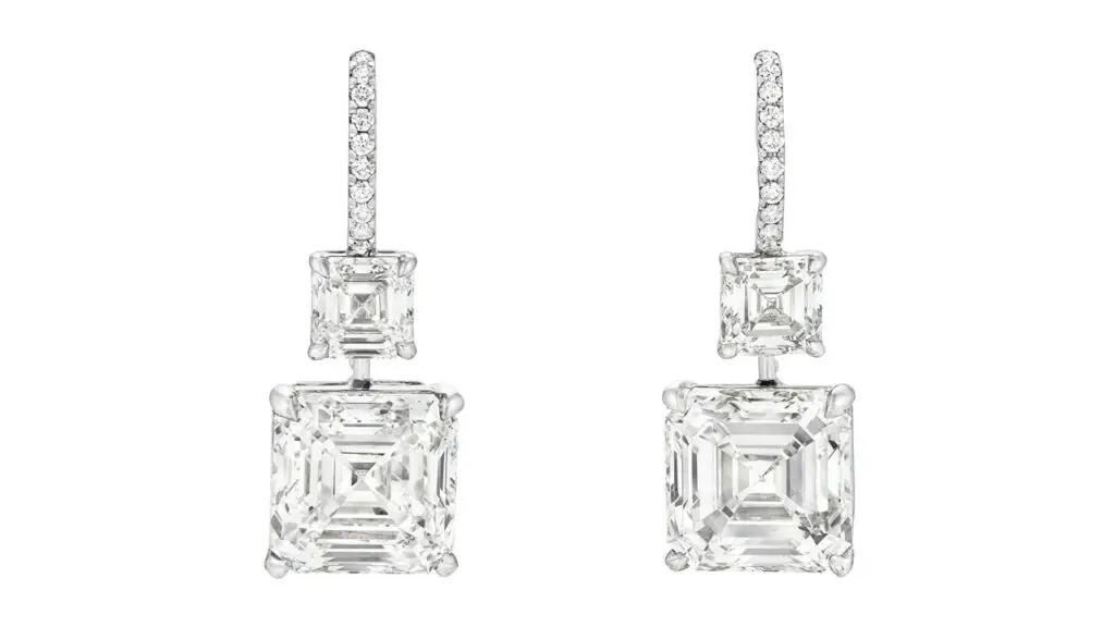 These earrings sport two square emerald-cut diamonds each. The two largest are a 6.04-carat, I, VVS2 stone and a 6.01-carat, I, VS1 at Christie's