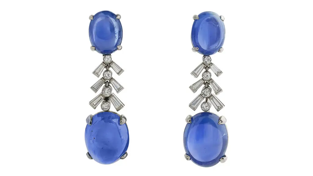 These earrings feature oval sapphires, the largest a 34.45-carat Burmese sapphire, as well as 30.20-, 13.71- and 13.23-carat Ceylon stones, with 2 carats of round and tapered baguette-cut diamonds at Christie's image