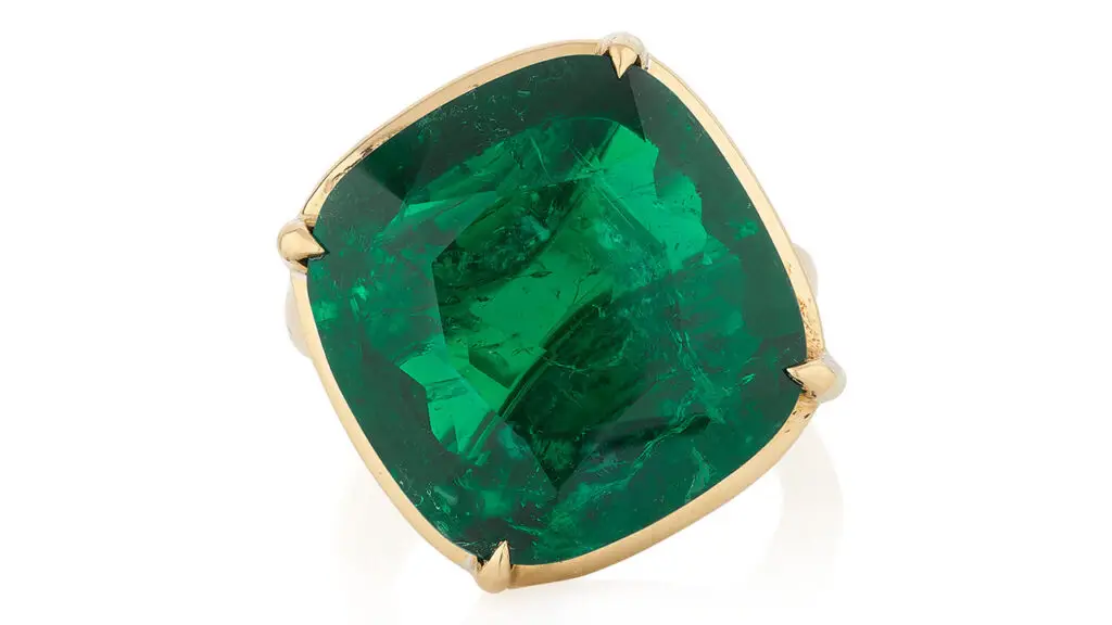 A ring bearing a 14.69-carat Colombian emerald at Phillips image