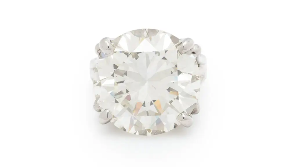 This ring centers a round brilliant-cut, 17.13-carat, N, VS2 diamond at Freeman's image