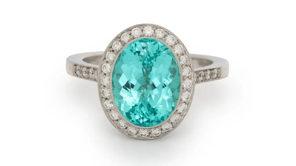 This Tiffany & Co. ring bears an oval, 4.36-carat Paraiba-type tourmaline from Mozambique, with a halo of round diamonds weighing a total of 0.61 carats at Freeman's image