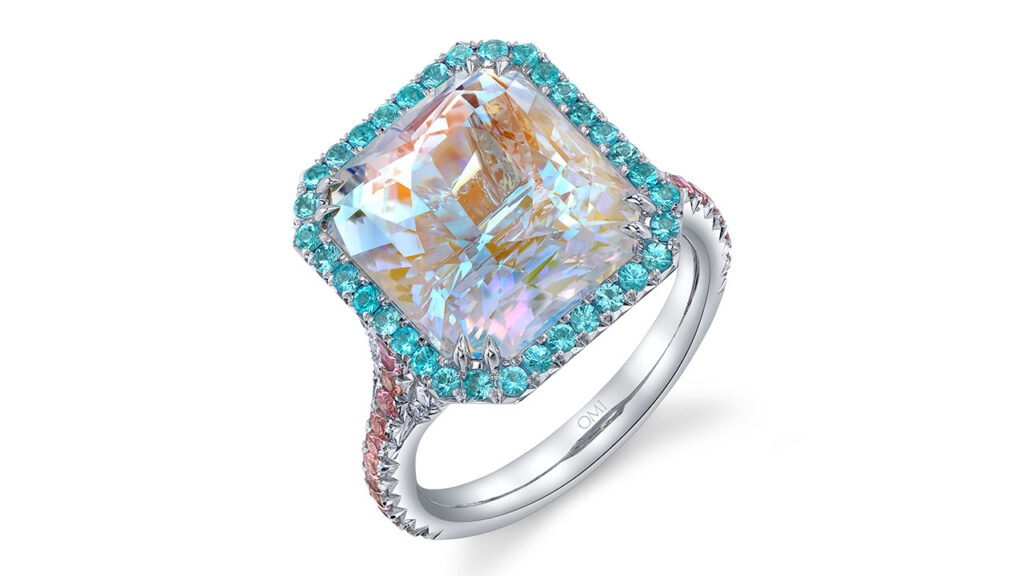 An Omi Privé ring featuring a faceted moonstone Paraiba tourmalines and orange sapphires image