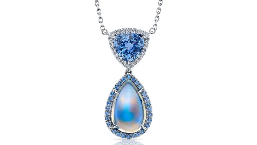 Platinum pendant by Omi Privé with sapphires diamonds and a pear shaped moonstone image