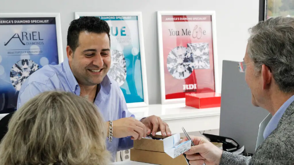 RDI Diamonds staff showing goods to clients image