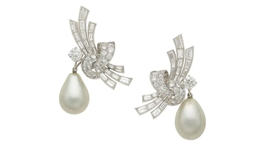 These Van Cleef & Arpels earrings feature natural pearls, 5 carats of baguette and full-cut diamonds, and 1 carat of European-cut diamonds at Heritage Auction image