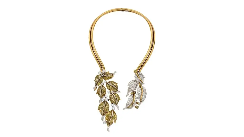 A nature-inspired jewelry suite by designer Paul Flato features two sculptural leaf clusters with single-cut colored diamonds weighing approximately 26.60 carats and about 16 carats of full-cut near-colorless diamonds. The piece is convertible and can be worn several different ways at Heritage Auctions image