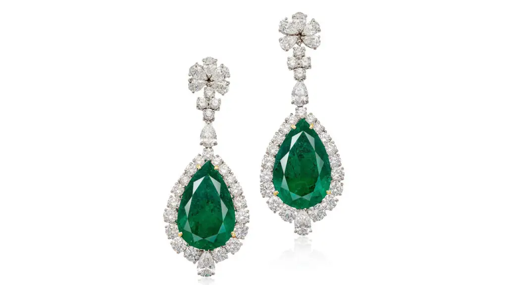 A pair of earrings with pear-shaped Colombian emeralds — one 11.52 carats, the other 13.74 carats — and an estimated 10 carats of pear-shaped and brilliant-cut diamonds at Sotheby's image