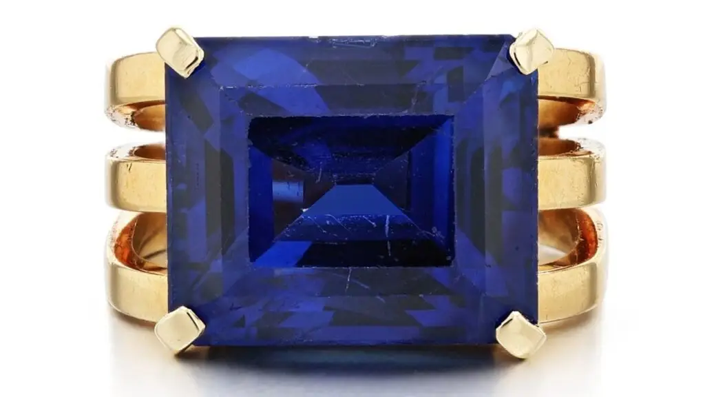 A Dinh Van ring starring a rectangular step-cut, 13.80-carat Burmese sapphire in an openwork mount at Sotheby's image