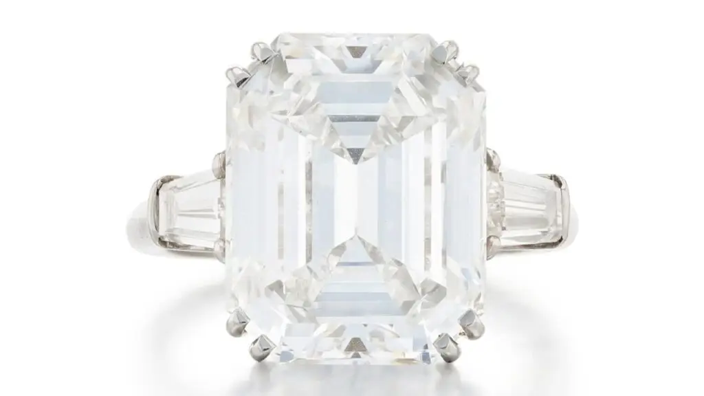 This Harry Winston ring bears a rectangular cut-cornered, 7.83-carat, E-color, VS1-clarity diamond between baguette-cut stones at Sotheby's image