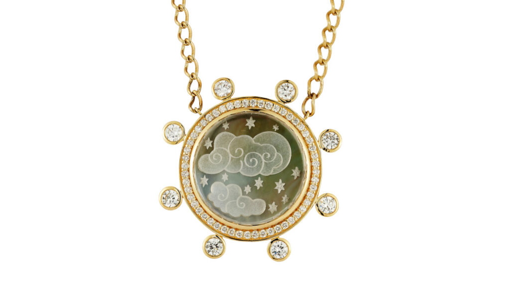 Cloud Caspian necklace with carved rock crystal backed by mother of pearl image