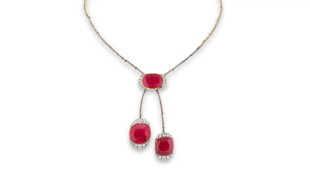 A Chaumet necklace from around 1902 features three cushion-shaped Burmese rubies accented with circular- and rose-cut diamonds at Phillips image