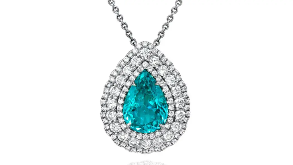A necklace featuring a pendant with a pear-shaped, 5.86-carat Brazilian Paraiba tourmaline in a brilliant-cut diamond surround at Phillips image