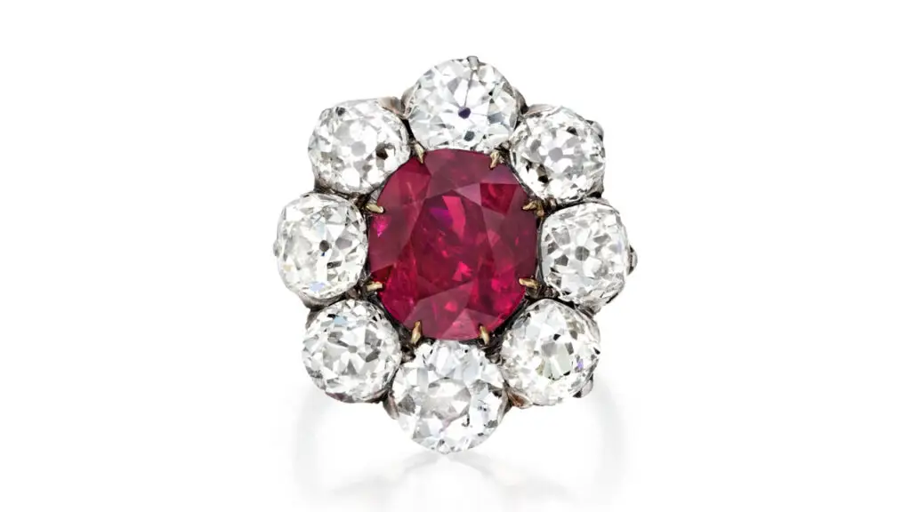 This ruby ring features an oval, 5.27-carat Burmese ruby in a surround of eight old-cut diamonds at Phillips image
