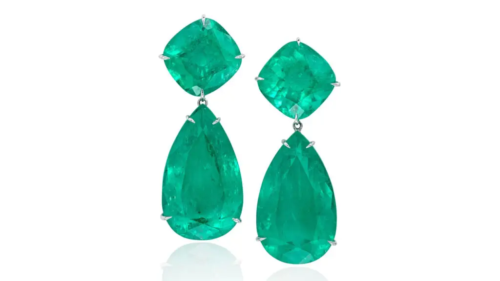 These earrings each sports a cushion- and a pear-shaped Colombian emerald at Phillips image