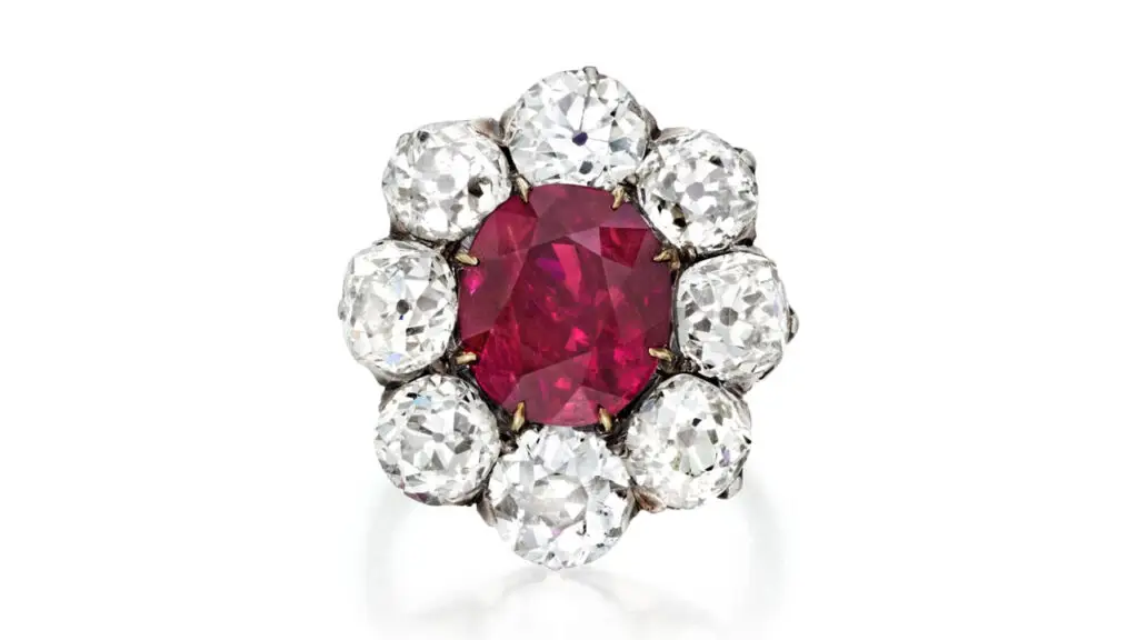 This ring contains an oval, 5.27-carat Burmese ruby in a surround of eight old-cut diamonds at Phillips image