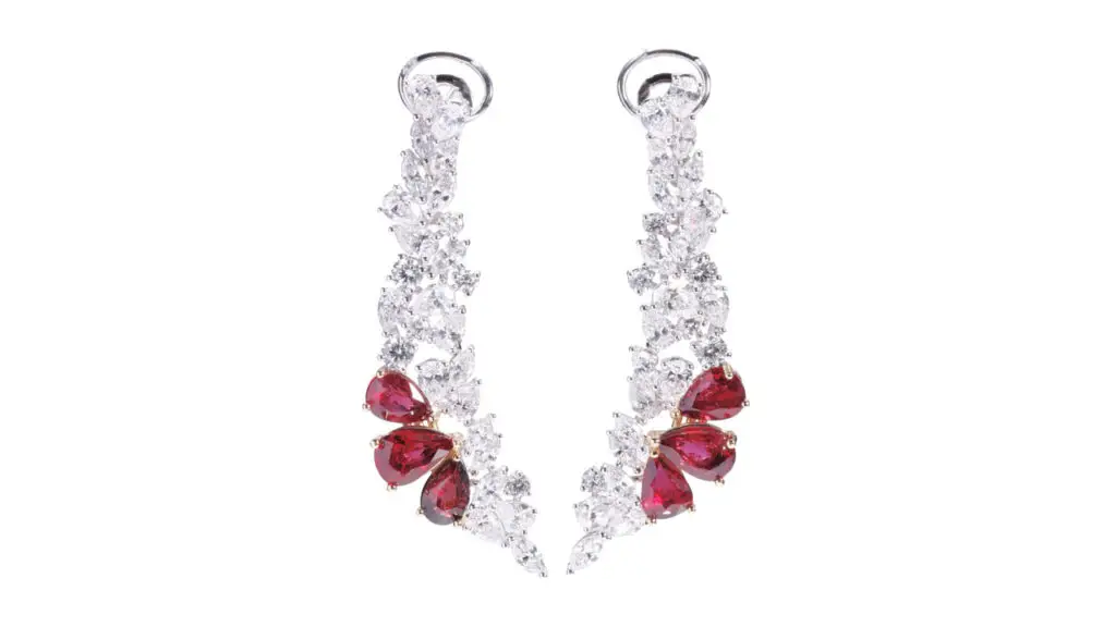 A pair of earrings, these comprise six pear-shaped Mozambique rubies weighing between 1 and 1.02 carats, and pear, marquise and circular-cut diamonds at Poly Auction image