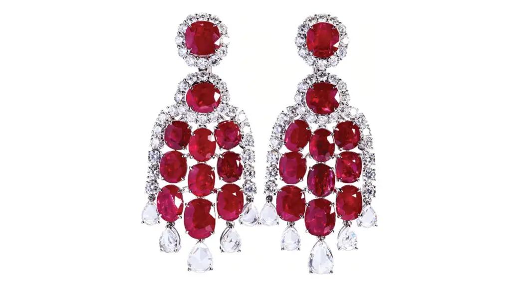 A pair of earrings featuring 22.68 carats of cushion and oval Burmese rubies, with rose- and circular-cut diamonds at Poly Auction image