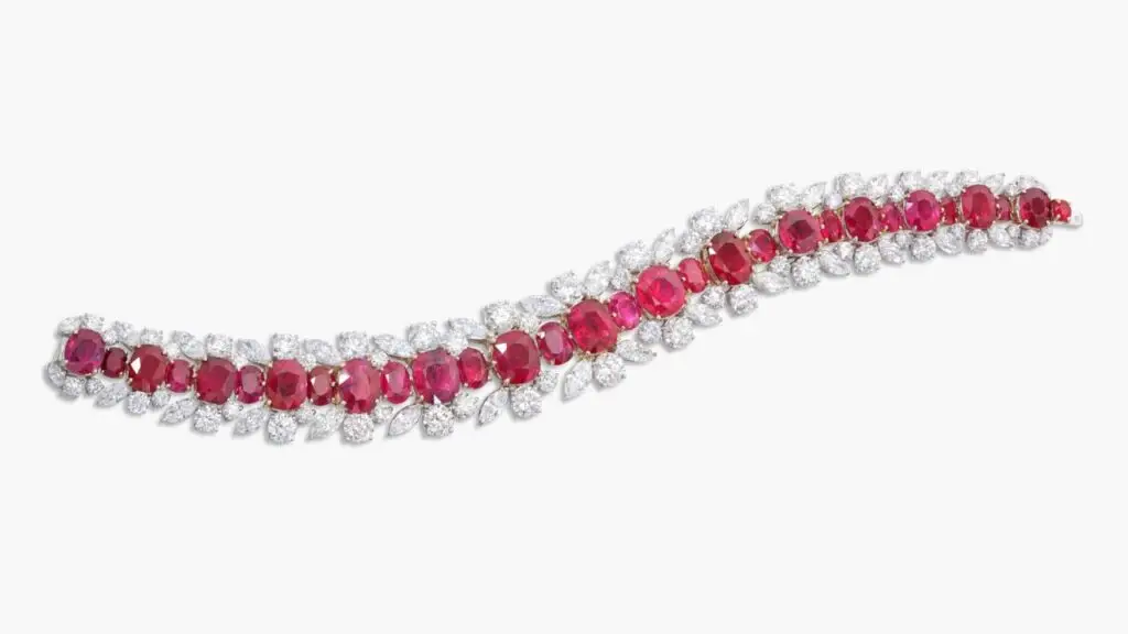 A bracelet centering a line of oval and cushion-shaped Burmese rubies, between lines of marquise-shaped and brilliant-cut diamonds at Sotheby's image