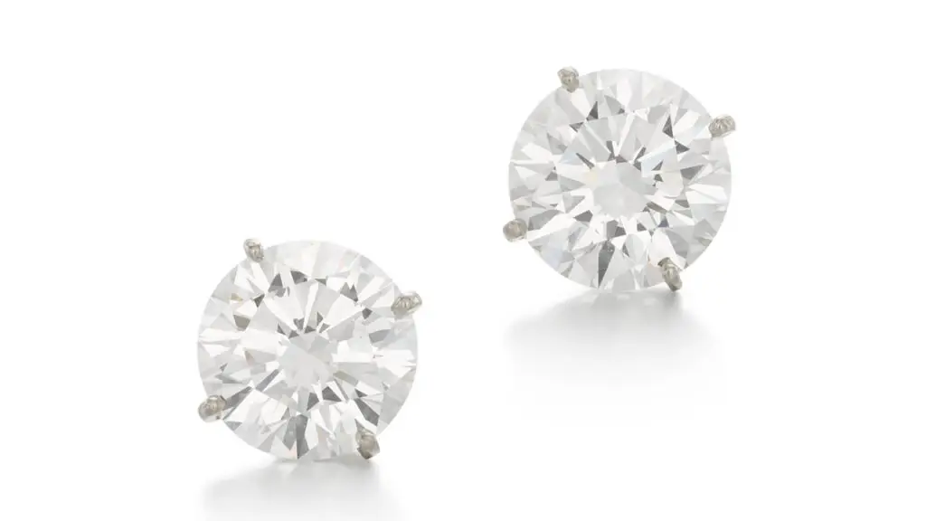 This pair of earrings bearing brilliant-cut, D-color, VVS2-clarity diamonds weighing 3.65 and 3.82 carats at Sotheby's image