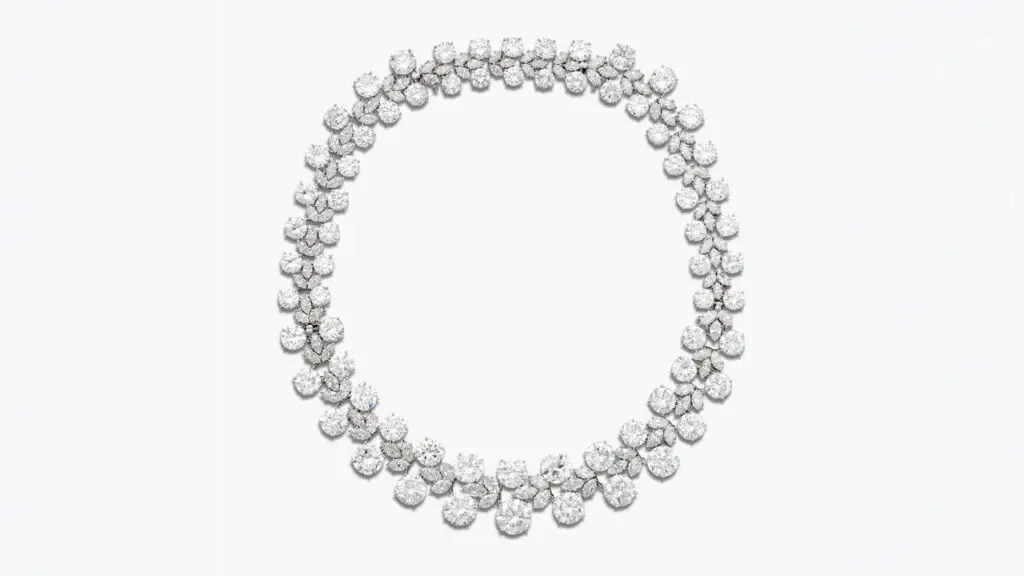 A Harry Winston necklace, which can also be converted into two bracelets. It comprises graduated pairs of round diamonds alternating with marquise-shaped diamond clusters at Sotheby's image