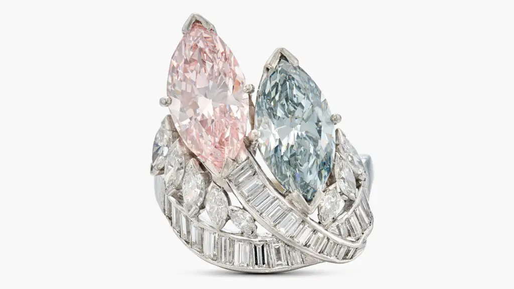A toi et moi ring with two marquise-shaped diamonds – a 2.20-carat, fancy-pink, VS1 and a 2.12-carat, fancy-grey-blue, SI2 diamond – accented by near-colorless marquise-shaped and baguette diamonds at Sotheby's image