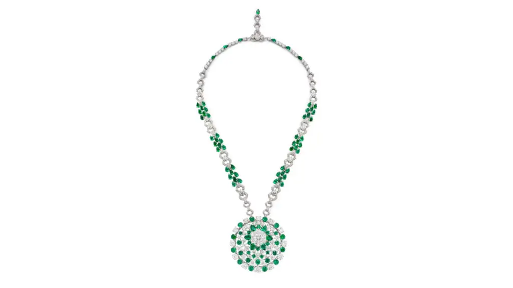 A Graff necklace sports a pendant with brilliant-cut, 3.10-carat diamond and brilliant-cut, pear-shaped diamonds and pear-shaped and circular-cut emeralds. The necklace showcases brilliant-cut diamonds and pear-shaped emeralds image