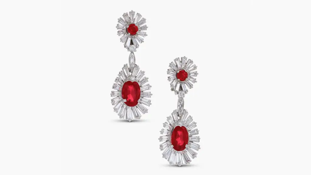 These Boucheron earrings each have an oval-shaped Burmese ruby, weighing 3.98 and 3.26 carats, both in a tapered-baguette diamond surround at Sotheby's image