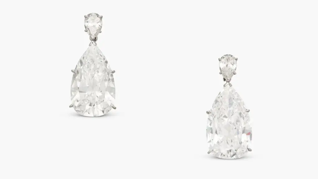 These earrings feature two large pear-shaped diamonds — one a 12.24-carat, F-color, VVS2-clarity stone, and the other an 11.68-carat, D VS2 at Sotheby's image