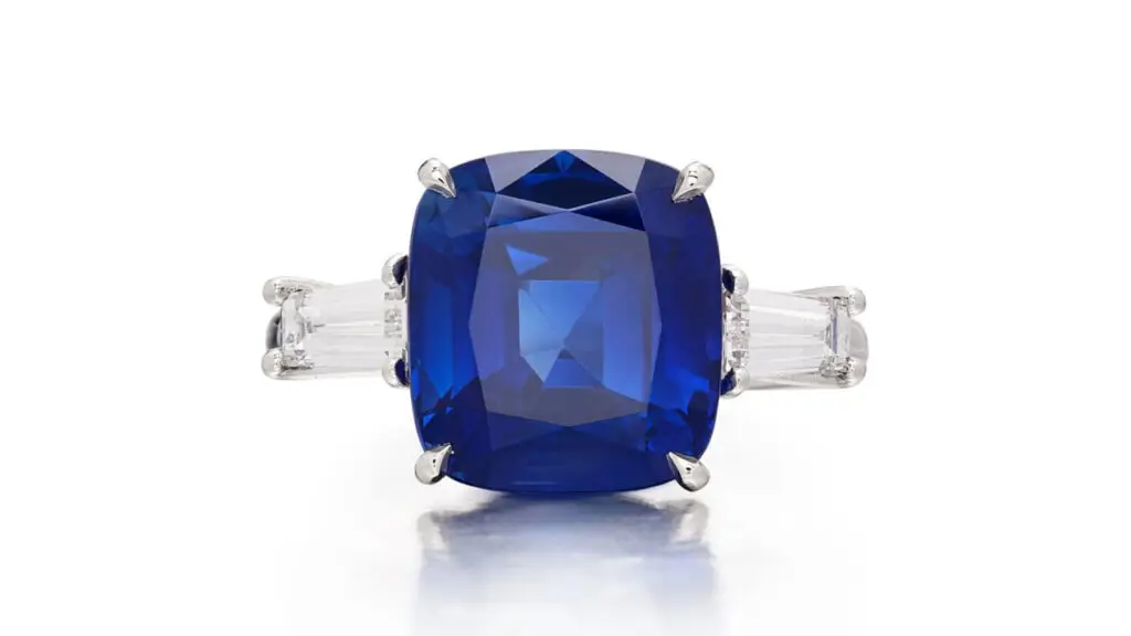 This ring sports a cushion-cut, 6.98-carat Kashmir stone with tapered baguette-diamond shoulders at Sotheby's image