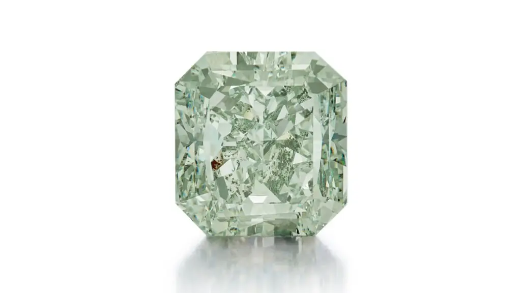 An unmounted cut-cornered rectangular mixed-cut, 5.23-carat, fancy-intense-green, SI2 diamond at Sotheby's image