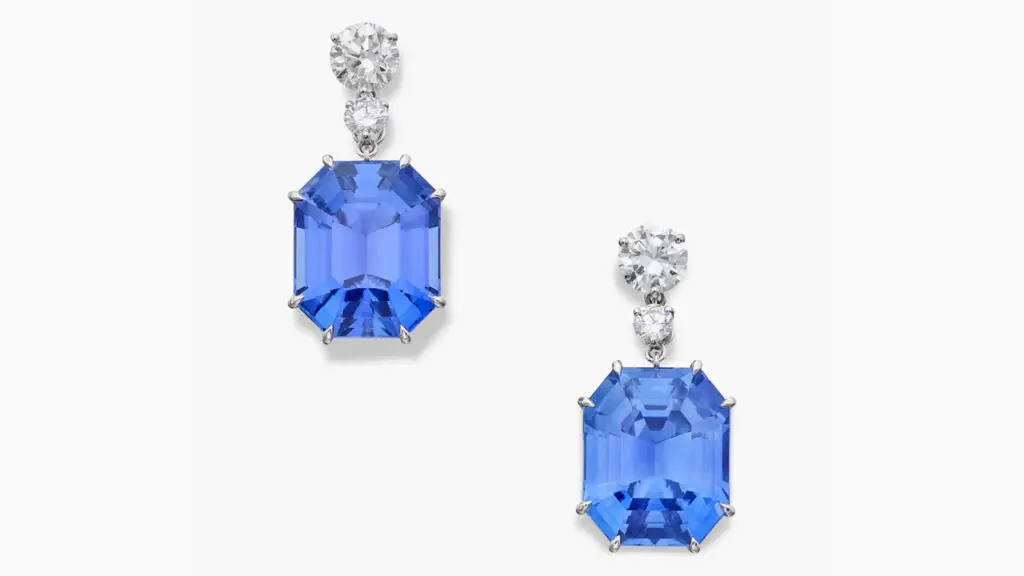 A pair of earrings featuring step-cut Ceylon sapphires weighing 35.74 and 30.54 carats, topped by diamonds at Sotheby's image
