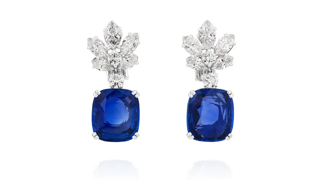 A pair of earrings sporting 12.31- and 12.69-carat Ceylon sapphires at Phillips image