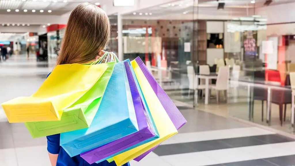 A woman at a shopping mall image