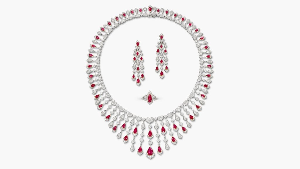 A ruby and diamond demi-parure comprising a fringe necklace, a pair of chandelier earrings and a ring. The 60 Burmese rubies, ranging from 0.19 to 2.09 carats, have a total weight of 26.78 carats, while the brilliant-cut diamonds total 12.65 carats at Sotheby's image