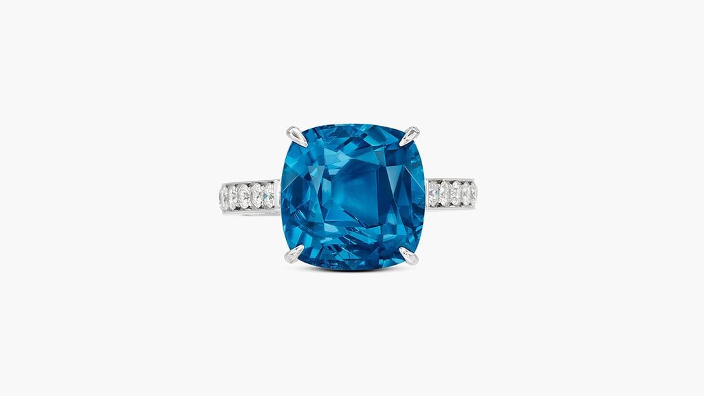 A ring bearing a cushion-cut, 7.52-carat Brazilian Paraiba tourmaline with brilliant-cut diamonds on the band at Sotheby's image