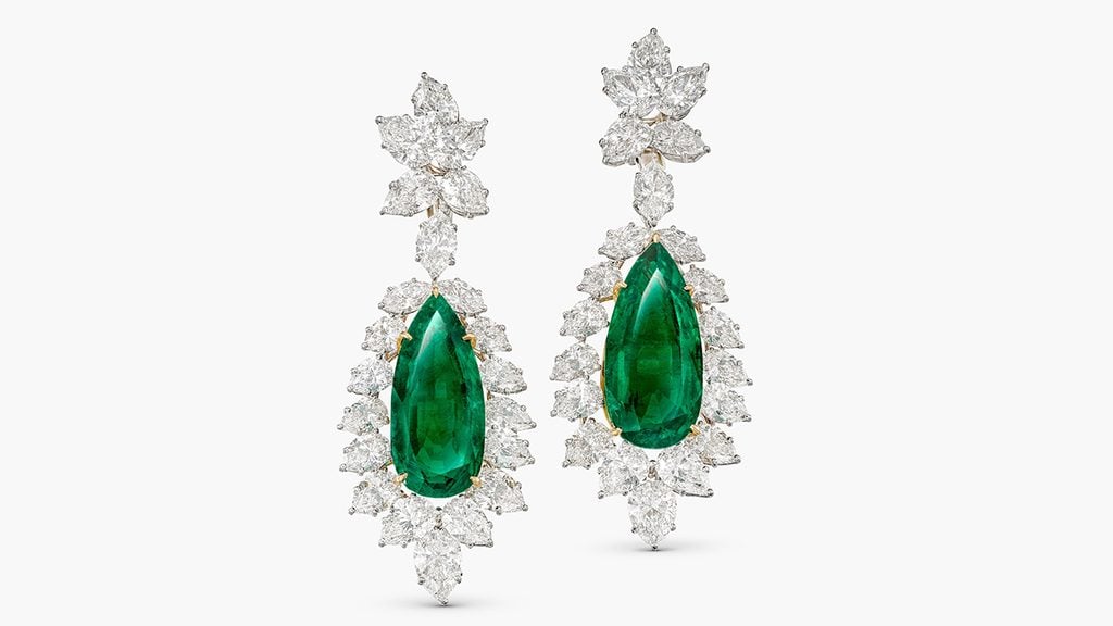Also from Harry Winston, this pair of earrings features pear-shaped Colombian emeralds of 16.27 and a 17.03 carats, framed and suspended from pear- and marquise-shaped diamonds at Sotheby's image