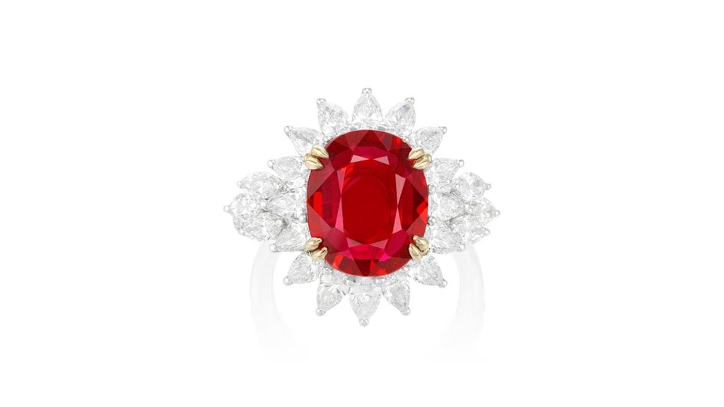 This ring bears an oval, Mozambican ruby weighing 6.06-carats, in a pear- and marquise-shaped diamond surround and brilliant-cut diamond shoulders at Phillips image