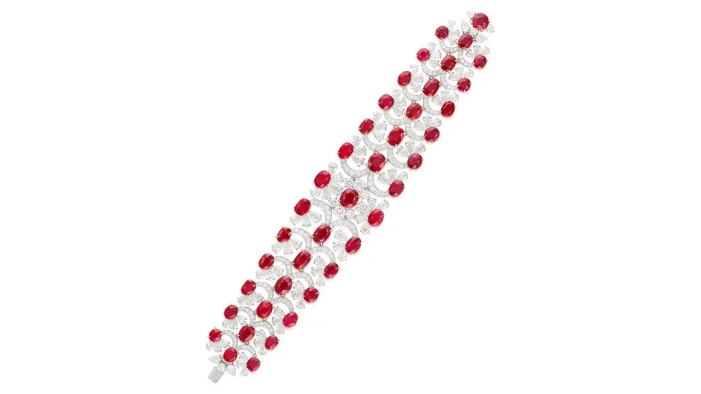 A bracelet comprising 40 oval, cushion-shaped and circular-cut Burmese rubies, adorned with pear-shaped and brilliant-cut diamonds at Phillips image