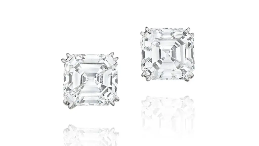 Pair of Taffin ear clips featuring square emerald-cut, D-color diamonds at Bonhams image