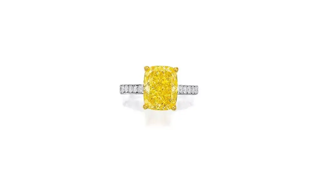 Ring sporting a cushion-shaped, fancy-vivid-yellow, SI2-clarity diamond at Bonhams image