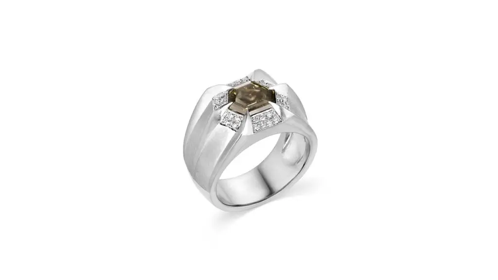 Platinum ring with a fancy-cut, fancy natural color diamond weighing 2.09 carats and 0.12 carats of white diamonds image
